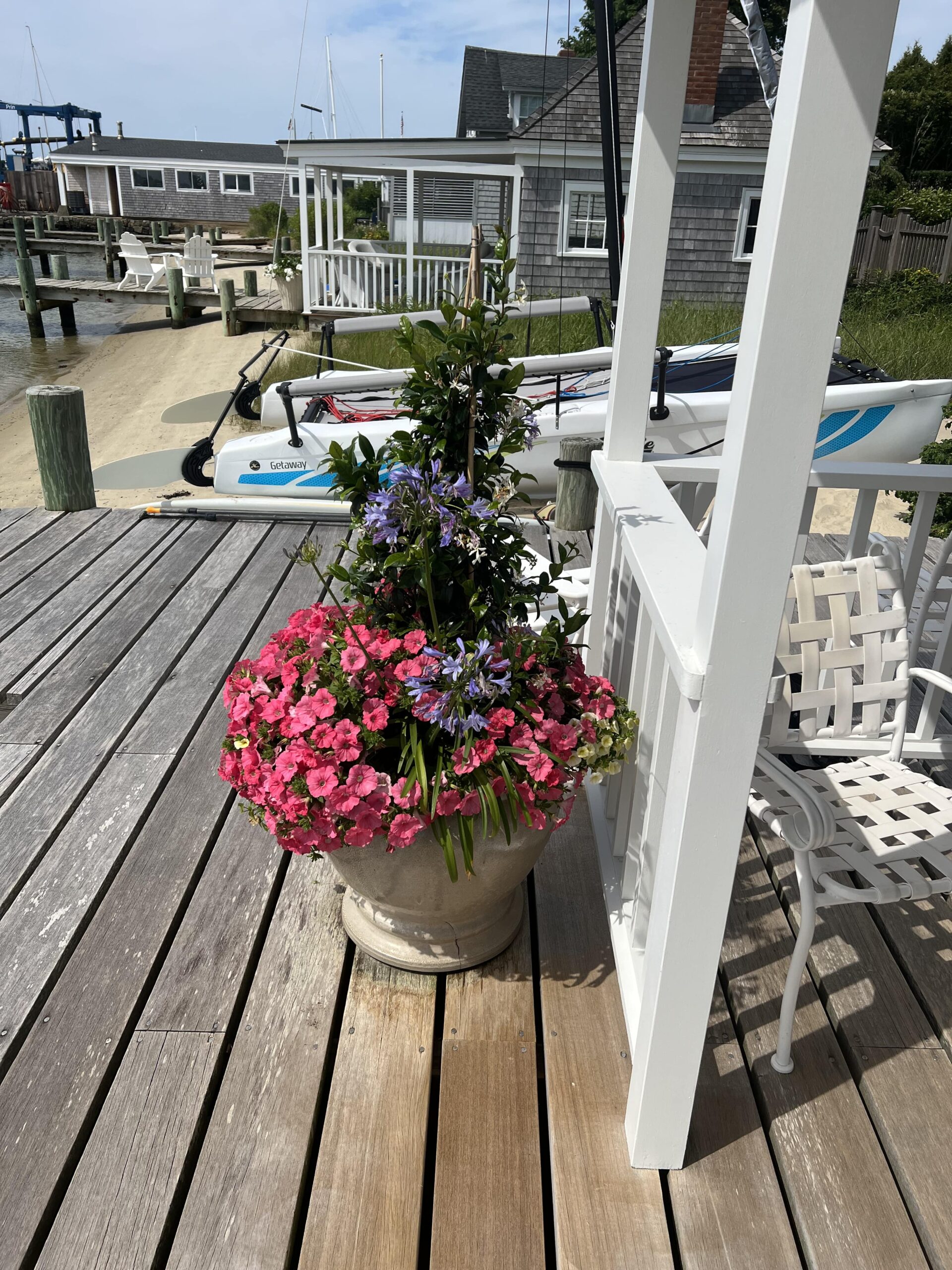 Seasonal flower pot planting installed on a porch by a professional landscaping company on Martha’s Vineyard