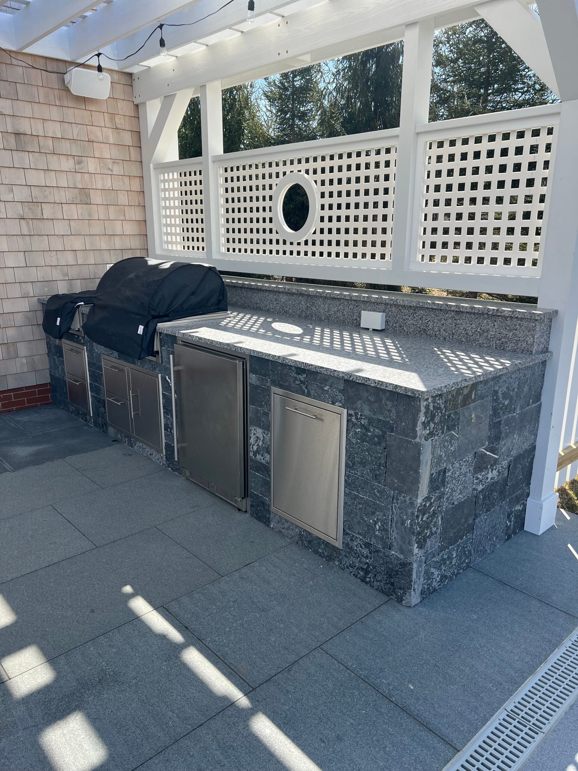 Custom outdoor BBQ installation creating a functional outdoor kitchen on Martha’s Vineyard