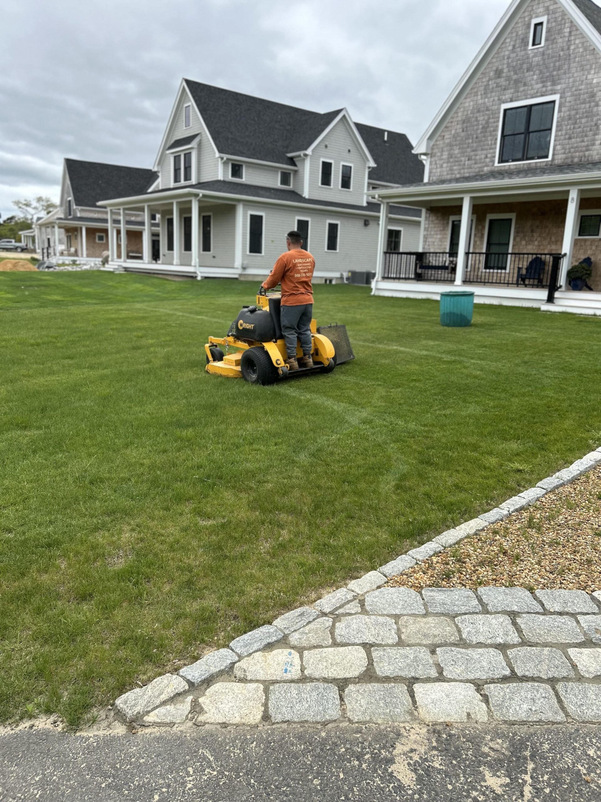 Plant bed maintenance with weekly lawn mowing on a professionally maintained Martha’s Vineyard property