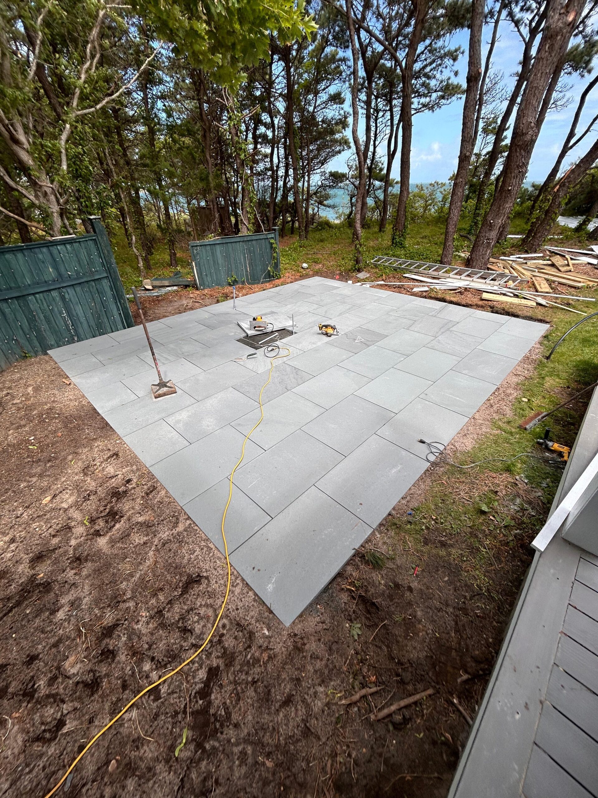Stepping stone path leading to a patio on a Martha’s Vineyard property