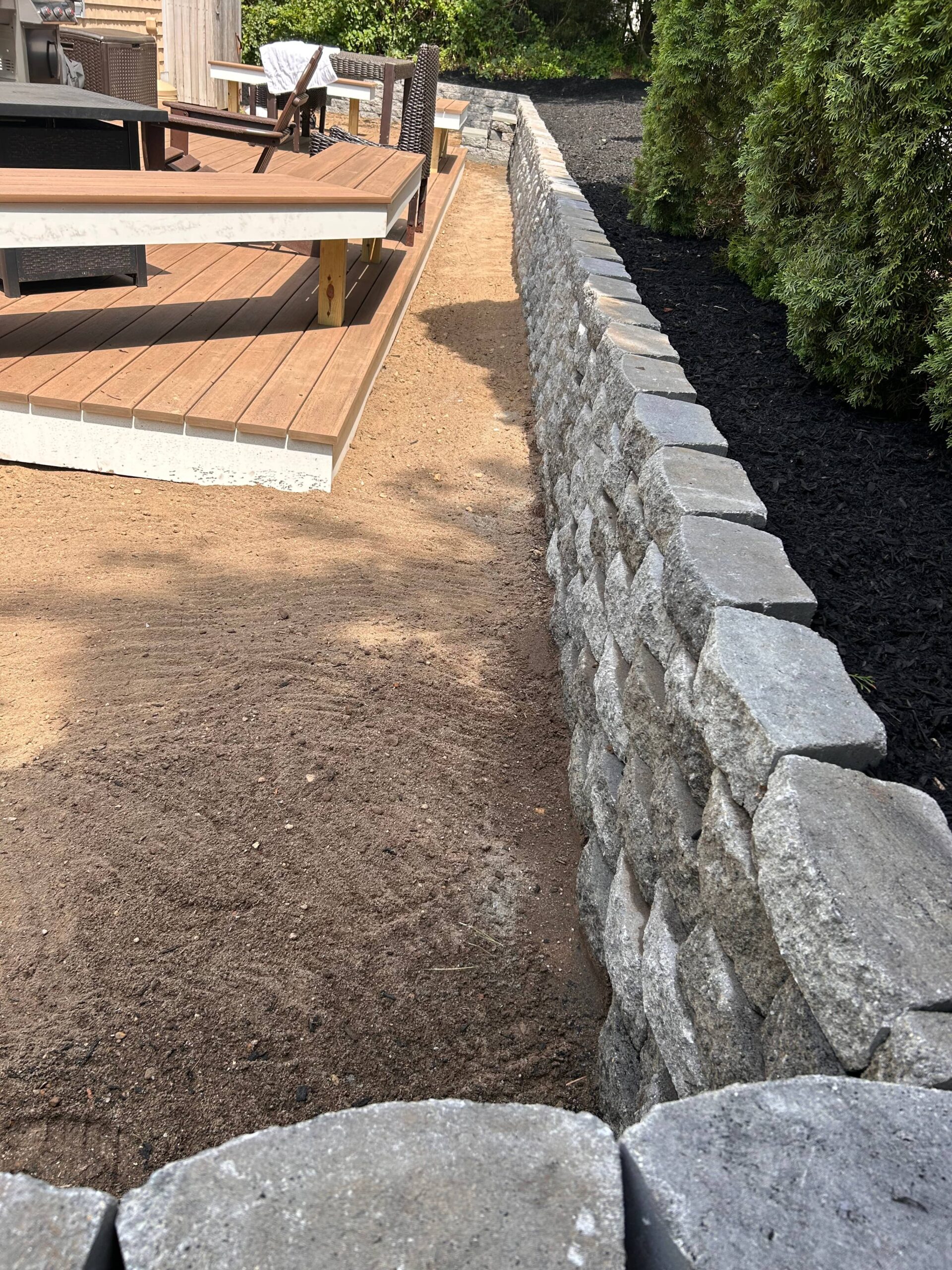 ScapeStone retaining wall installation providing structure and visual appeal on Martha’s Vineyard