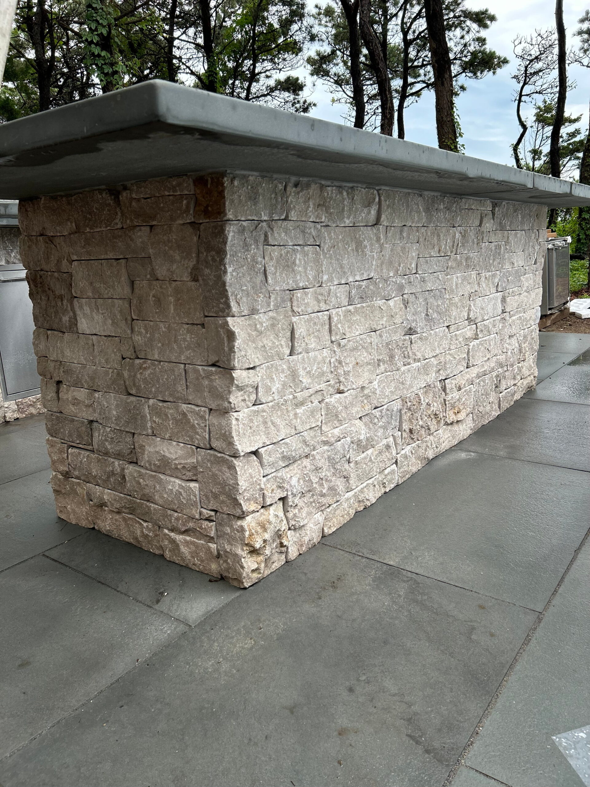 Stone veneer outdoor BBQ installation on a Martha’s Vineyard property