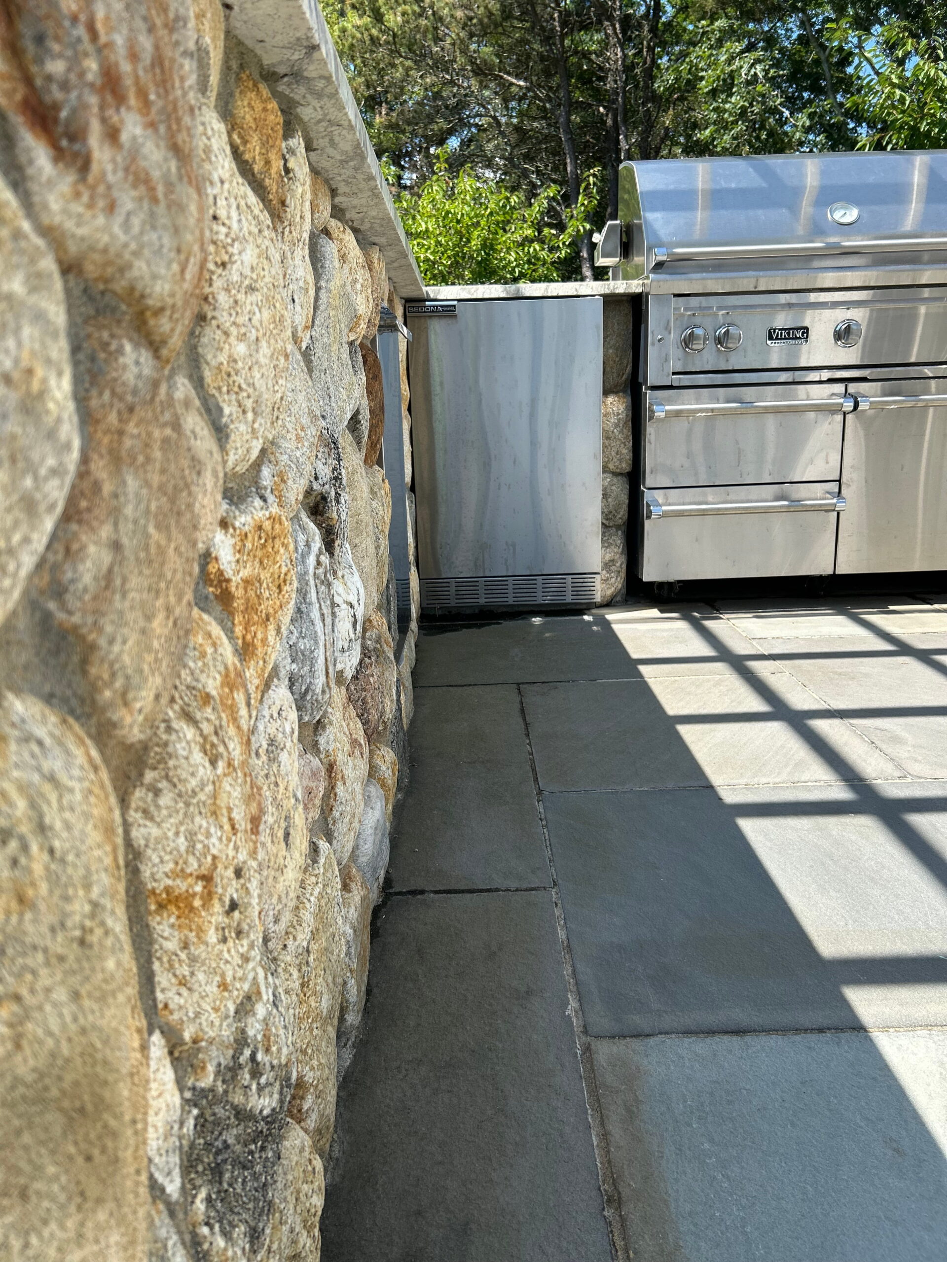 Natural stone veneer installation enhancing an exterior surface on Martha’s Vineyard