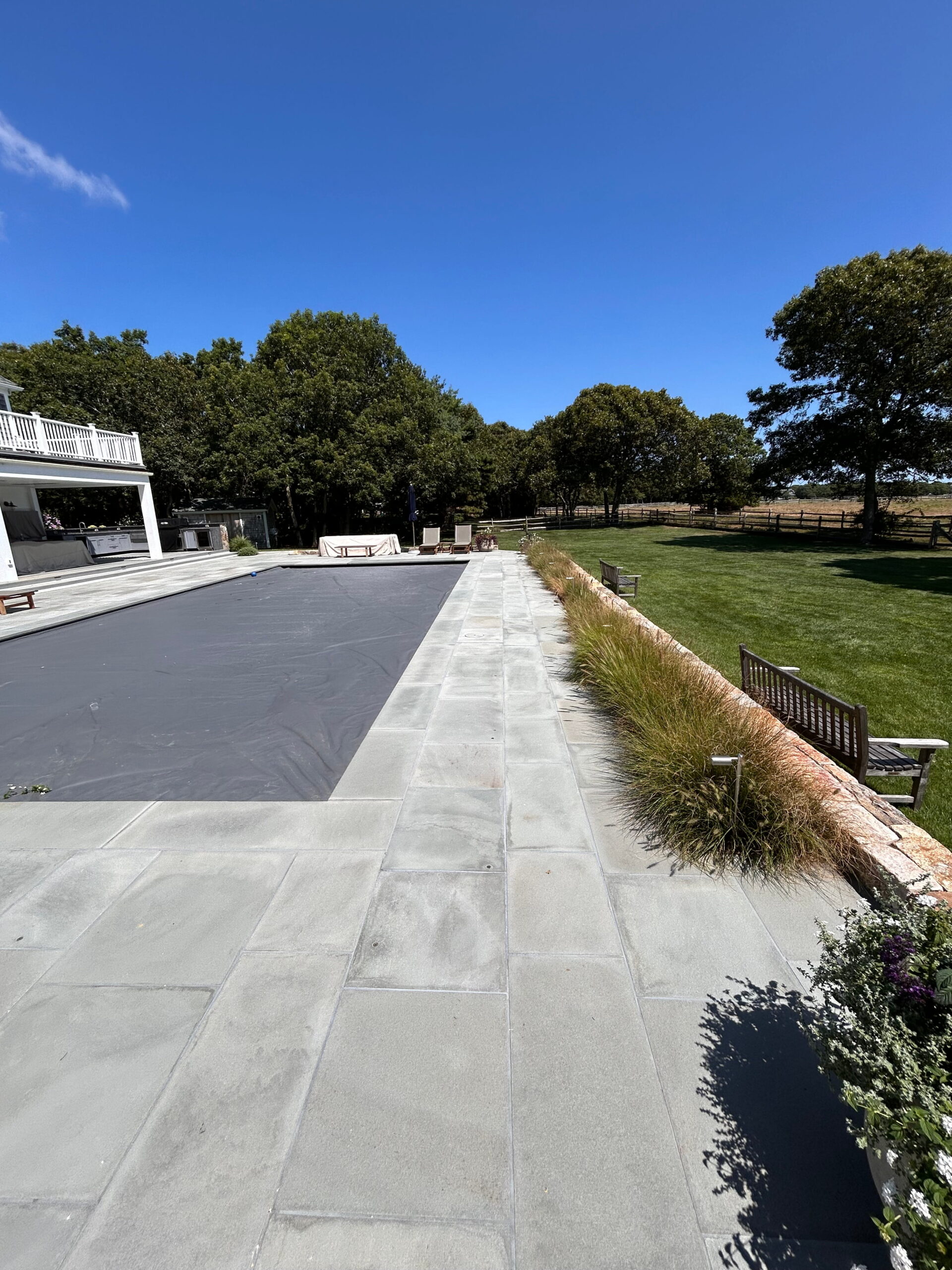 Custom patio installation with stone pavers at a Martha’s Vineyard home