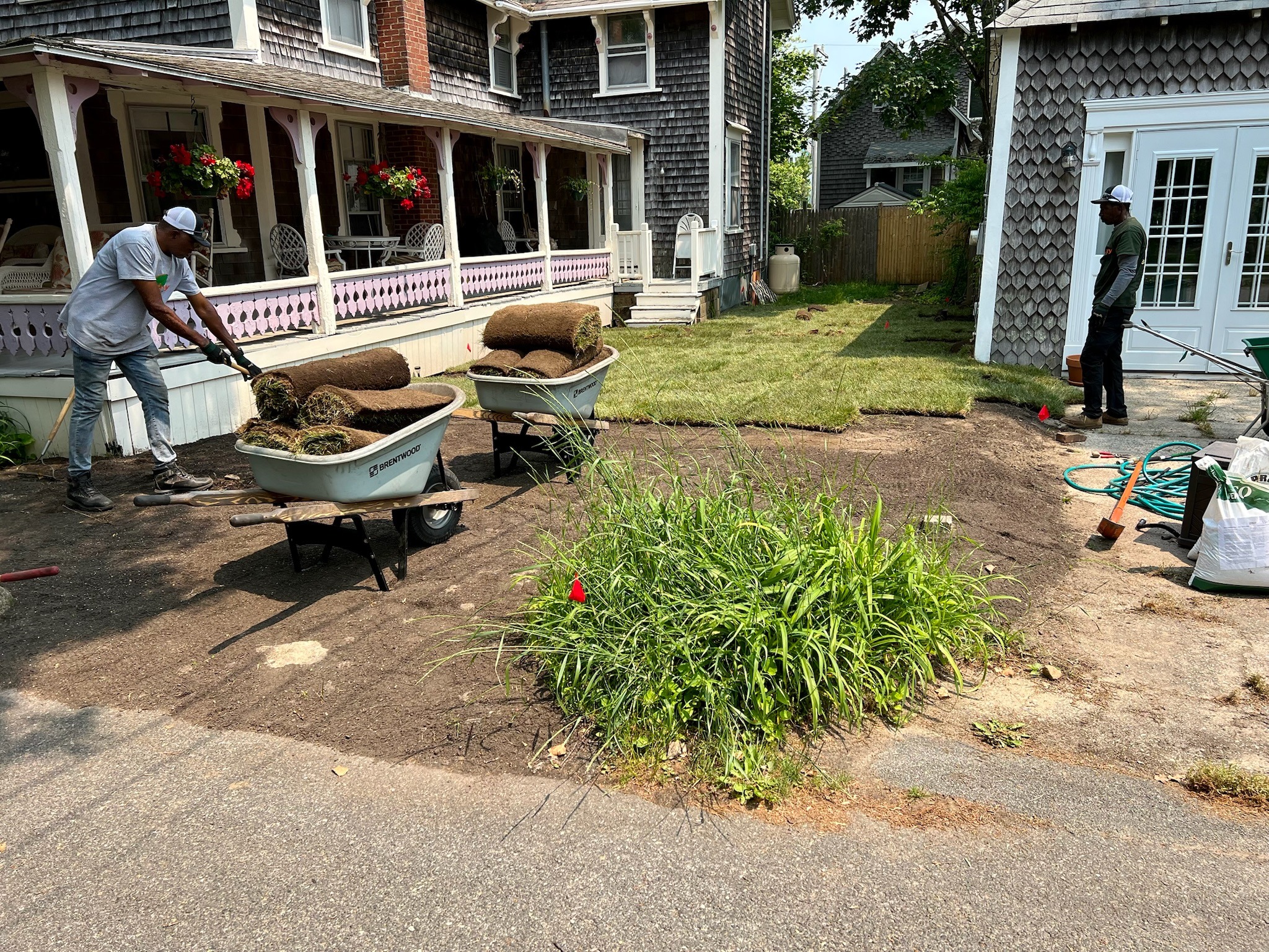 Sod installation in progress with fresh sod being laid on Martha’s Vineyard