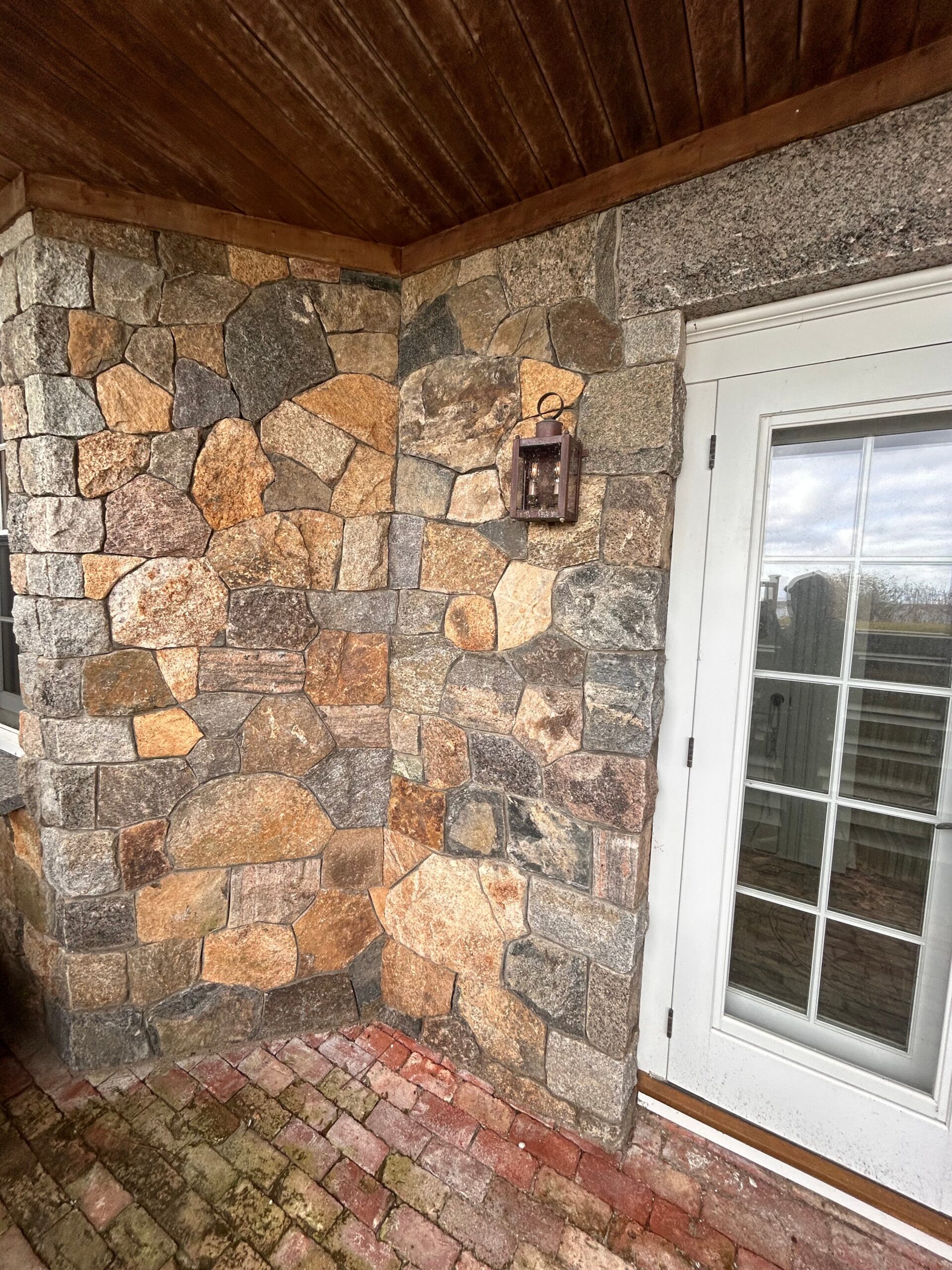 Stone veneer wall installation by a professional contractor on Martha’s Vineyard