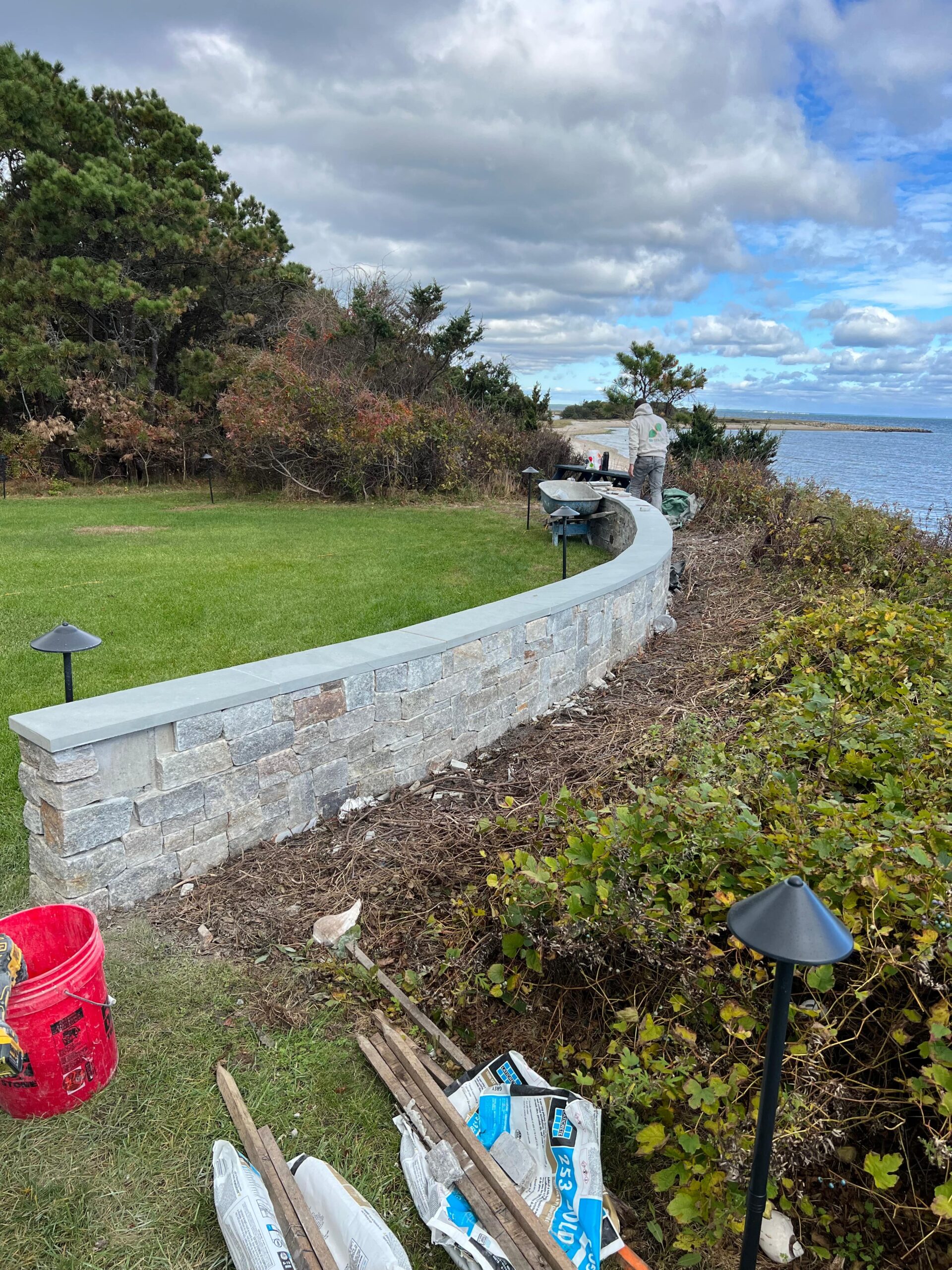 Natural stone veneer wall installation by a professional masonry contractor on Martha’s Vineyard