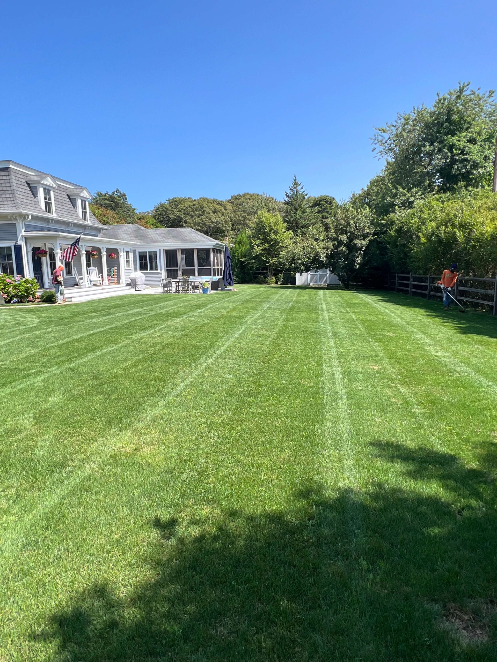 Lawn mowing service including edging and trimming along walkways on Martha’s Vineyard
